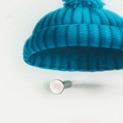 Moderne Glas Hängegarderobe mit bunten Mützen - Trujano^Wohnen Best